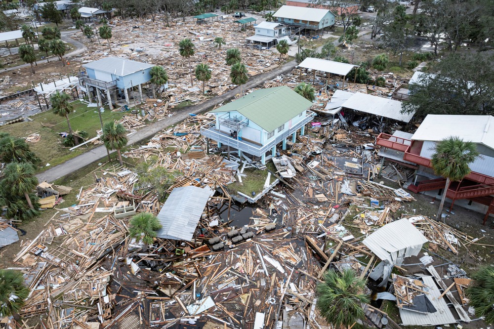 Volunteers working together to clean up the damage caused by Hurricane Helene